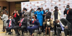 TSC CEO Nancy Macharia poses for a photo with a selection panel tasked with recruiting new commissioners