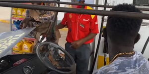 The Covid-19 2020 car series at a fuel station.