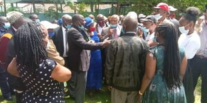 The family gathered outside a Nyeri Hospital where a body of their kin reportedly went missing.