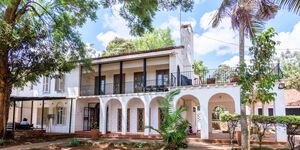 This seven-bedroom, single-bath home, set on one acre, has two houses with a wall in between the lots and parking for more than seven cars. It's on the market for KES250 million