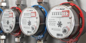 A file image of three water meters installed on a building
