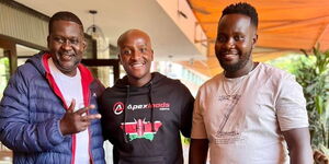 Daniel "Churchill" Ndambuki aka Mwalimu King'ang'i of the Churchill Show(left) Appexloads CEO Charles Thuo(middle) and musician Sebastian Namayi(right) during Thuos's visit to Kenya on January 24, 2023