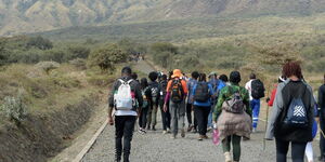 Tourists at the bottom of Mt Longonot ready for a hike