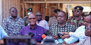 Transport Cabinet Secretary James Macharia (second left) and Interior CS Fred Matiang'i (third from left) address the press in Mombasa.