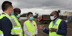Transport Cabinet Secretary James Macharia with contractors of the Kenol-Marua dual carriageway, July 2020.
