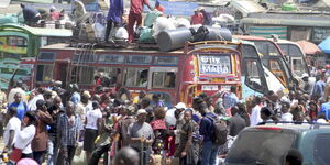 Travellers stranded at Machakos County Bus in Nairobi on Sunday, March 29, 2021.