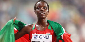 Agnes Tirop celebrates winning bronze in the Women's 10,000m final at the World Athletics Championships in Doha in 2019