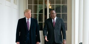 U.S. President Donald J. Trump walks with Kenyan President Uhuru Kenyatta on the White House colonnade on February 6, 2020.