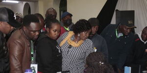 UDA's Kipchumba Murkomen, Margaret Wanjiru and party agents and Azimio politicians converse with the IEBC officials on Friday, August 12, 2022.