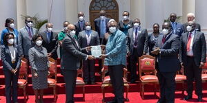 President Uhuru Kenyatta receives a report of the Presidential Taskforce on Review of power purchase agreements on Wednesday, September 29.