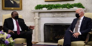 President Uhuru Kenyatta (left) meets with U.S President Joe Biden in the Oval Office of the White House in Washington, October 14, 2021.
