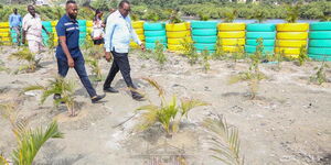 President Uhuru Kenyatta with Mombasa Governor Hassan Joho inspecting Kibarani during the initial stages of its transformation 