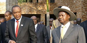 President Uhuru Kenyatta (left) and President Yoweri Museveni during a past summit in Uganda.