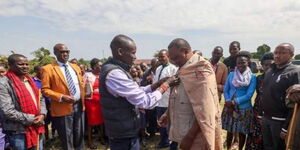 Former President Uhuru Kenyatta gifted a Maasai wrap in Narok county on Saturday, October 15, 2022.