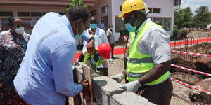 President Uhuru Kenyatta commissions the construction of a building in Kisumu on October 22, 2020.