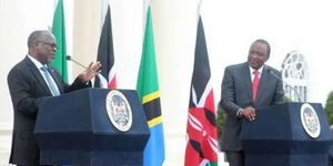 President Uhuru Kenyatta (right) with his late Tanzanian counterpart John Magufuli at a previous press conference in 2017. 