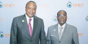 File image of Kenya'a President Uhuru Kenyatta with the late Robert Mugabe, former President of Zimbabwe