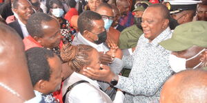 Kirinyaga Women Representative Purity Ngirici enjoys a cordial moment with President Uhuru Kenyatta at Sagana State Lodge on Wednesday, February 23, 2022