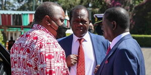 President Uhuru Kenyatta (left), Jubilee Secretary General Raphael Tuju (centre) and former Prime Minister Raila Odinga (right) at State House, Nairobi on Thursday, January 13, 2022