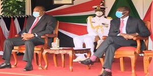 President Uhuru Kenyatta (left) with his deputy William Ruto (right) during Madaraka Day celebrations State House, Nairobi on June 1, 2020 