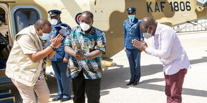 President Uhuru Kenyatta greets Deputy President William Ruto on arrival at the KWS Law Enforcement Academy in Manyani, Taita Taveta County on October 16, 2020