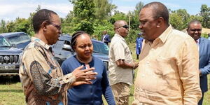 President Uhuru Kenyatta with Governor Anne Waiguru and Interior PS Karanja Kibicho during a development tour of Kirinyaga County in February 2020