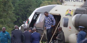 Former President Uhuru Kenyatta alights from Kenya Airforce One during a past function.