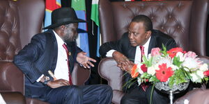 President Uhuru Kenyatta and his South Sudan counterpart Salva Kiir hold talks on the sidelines of the 25th AU Summit at Sandton International Convention Centre, Johannesburg, South Africa on June 15, 2018.