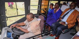 Former President Uhuru Kenyatta drives a 53-seater bus he donated to Partakilat Primary school on Saturday, October 15, in Narok.