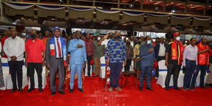 President Uhuru Kenyatta with Azimio La Umoja leaders Raila Odinga, Kalonzo Musyoka and Gideon Moi after the formation of the grand coalition at KICC on Saturday, March 12, 2022.