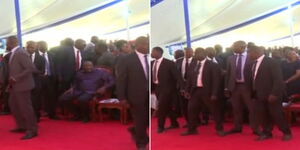 Former President Uhuru Kenyatta's security surrounding the former Head of State at George Magoh'as funeral in Siaya County on February 11, 2023.