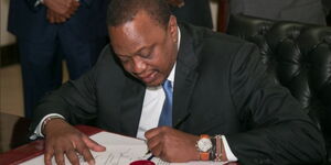 President Uhuru Kenyatta Signing Government Documents