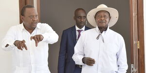 President Uhuru Kenyatta(left) alongside his Ugandan counterpart Yoweri Museveni