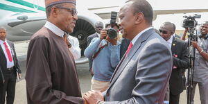 An undated file image of Nigerian President Muhammadu Buhari (left) and President Uhuru Kenyatta.