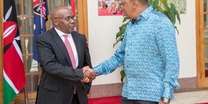 President Uhuru Kenyatta with former Attorney General Githu Muigai after he handed in his resignation letter to the at State House, Nairobi in 2018