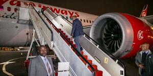 President Uhuru Kenyatta boards a Kenya Airways flight at the Jomo Kenyatta International Airport, Nairobi