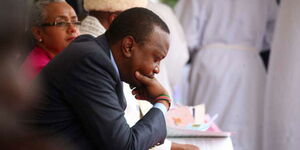 President Uhuru Kenyatta pictured during a church service in Nairobi in 2015