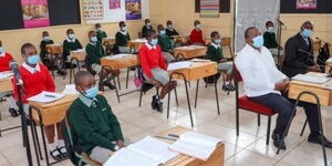 President Kenyatta with pupils of Westlands Primary School in Nairobi on May 13, 2021.