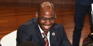Umoja Smmit party presidential candidate Walter Mong'are submitting his papers with the IEBC at the Bomas of Kenya.jpg