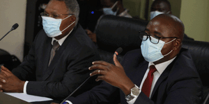 Unclaimed Financial Assets Authority chief executive John Mwangi (right) with director Thomas Mwadegu  during parliamentary grilling.