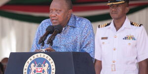 Undated photo of former President Uhuru Kenyatta and his ADC Brigadier Timothy Stelu Lekolool (in white) at a past event