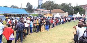 Undated photo of job seekers queuing for a job interview