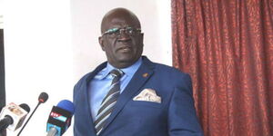 Undated photo of the late former Education Cabinet Secretary George Magoha addressing the press