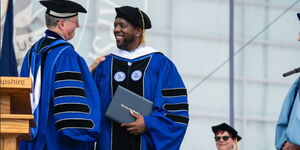 University of New Hampshire President James Warren Dean Jr (left) and Kenyan Ambassador Martin Kimani