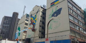 A triptych mural painted by Kenyan and Ukrainian artists in Nairobi on March 10, 2023.