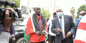 Ferguson Rotich Together with Kericho Governor Paul Chepkwony on Wednesday August 11