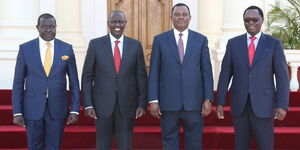 President William Ruto with incoming Solicitor General Shadrack Mose (far left), Attorney General Justin Muturi, and outgoing Solicitor General Ken Ogeto at State House on March 20, 2023.