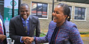 Kiharu MP Ndindi Nyoro (left) shares a light moment with Samburu West MP Naisula Lesuuda after a meeting of the Budget and Appropriation Committee on November 3, 2022 at Parliament Buildings- Nairobi. 