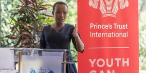 Susan Ekalale giving her gratitude speech at her home in  Nairobi, after receiving an Award on Thursday, October 21, 2021.