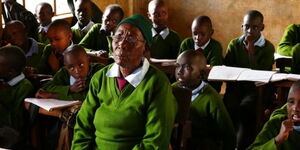Priscilla Sitenei together with her classmates at Leaders Vision Preparatory School in Ndalat